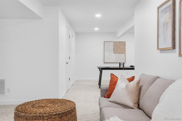 living room with light colored carpet