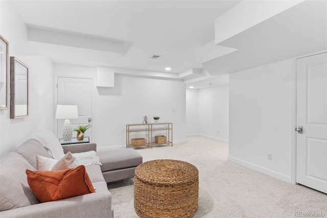 sitting room with light colored carpet