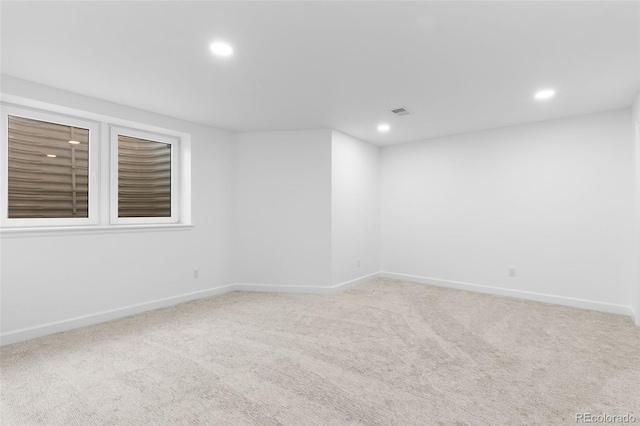 unfurnished room featuring carpet floors