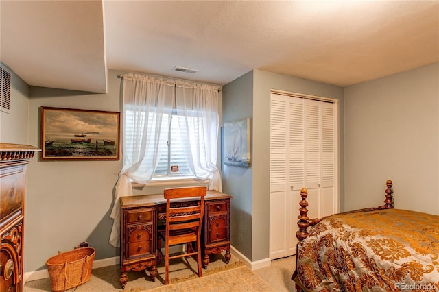 6687 Devinney Ct, Arvada, CO 80004 - carpeted bedroom featuring a closet and baseboards