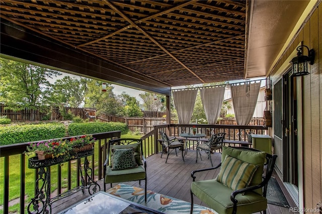 6687 Devinney Ct, Arvada, CO 80004 - deck featuring a fenced backyard and outdoor dining space