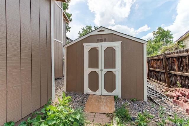 6687 Devinney Ct, Arvada, CO 80004 - view of shed with a fenced backyard