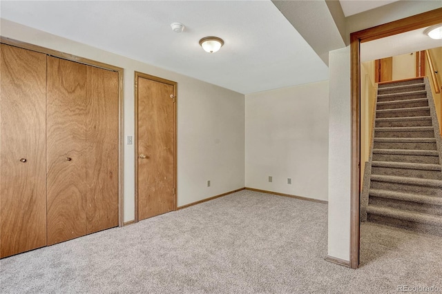 basement with light colored carpet