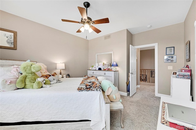 bedroom featuring light colored carpet and ceiling fan