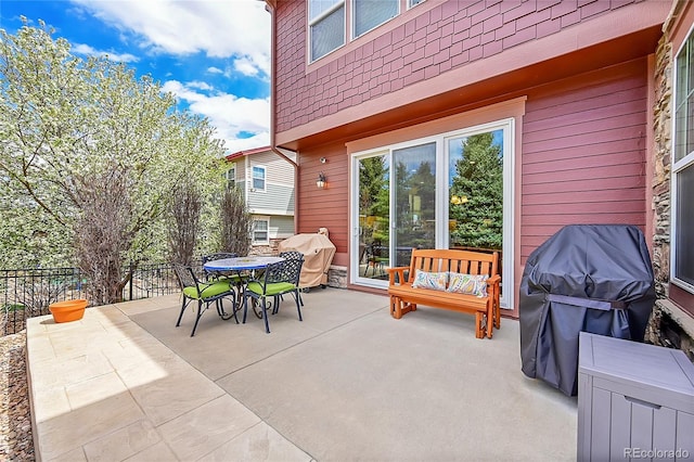 view of patio with outdoor lounge area and grilling area