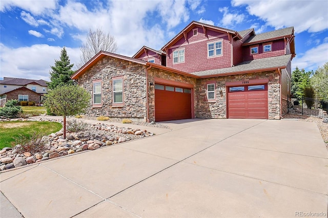 7999 S Blackstone Pkwy, Aurora, CO 80016 - craftsman-style house featuring driveway, stone siding, and an attached garage