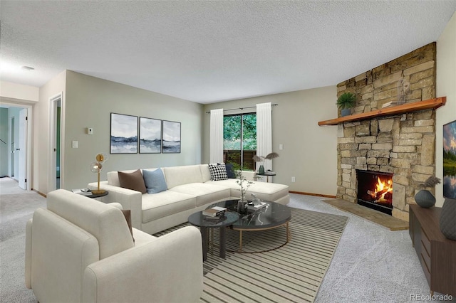 3335 S Ammons St Unit 6-105, Lakewood, CO 80227 - carpeted living area with a textured ceiling and a stone fireplace