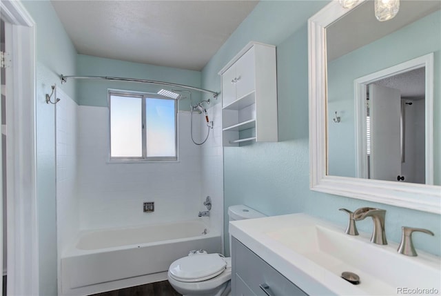 full bathroom with toilet, a textured ceiling, hardwood / wood-style flooring, vanity, and tiled shower / bath