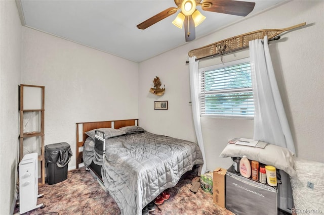 313 E Grant Ave, Fowler, CO 81039 - carpeted bedroom featuring a ceiling fan