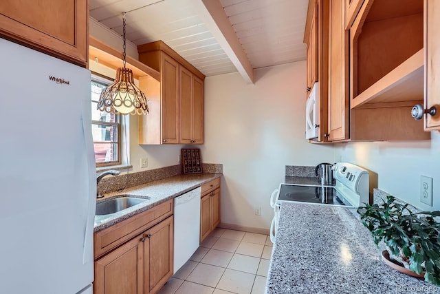 kitchen with light tile patterned flooring, white appliances, a sink, beamed ceiling, and pendant lighting