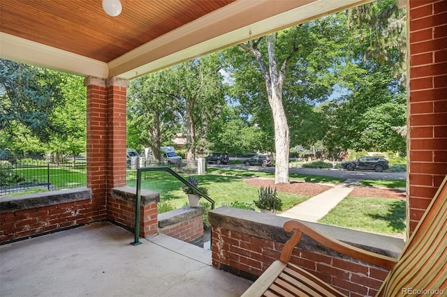 2360 S Milwaukee St, Denver, CO 80210 - covered porch with view of wooded area