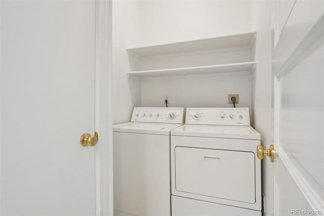 2360 S Milwaukee St, Denver, CO 80210 - washroom featuring independent washer and dryer