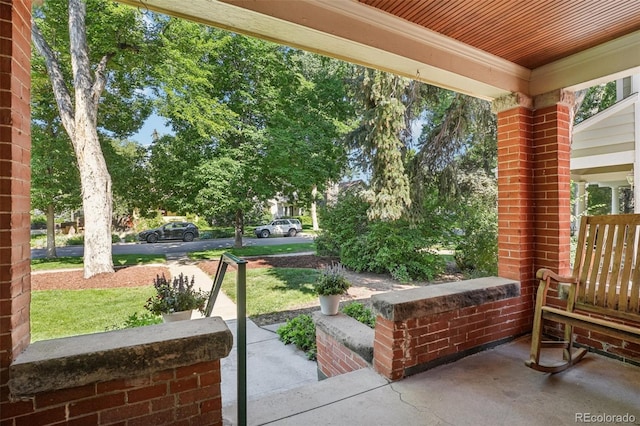 2360 S Milwaukee St, Denver, CO 80210 - covered porch featuring a lawn