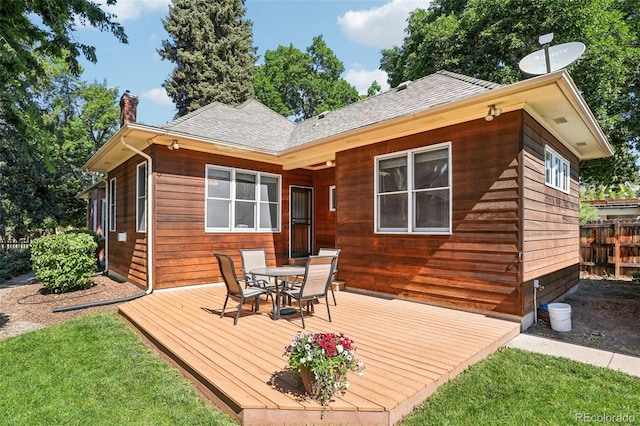 2360 S Milwaukee St, Denver, CO 80210 - wooden terrace with outdoor dining space