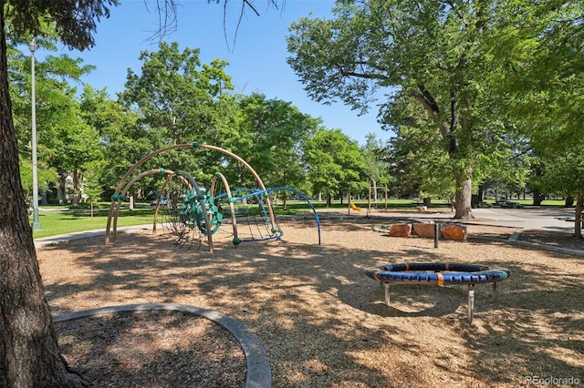 2360 S Milwaukee St, Denver, CO 80210 - community jungle gym featuring view of wooded area