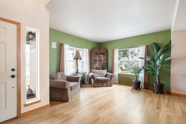 living area with light hardwood / wood-style floors