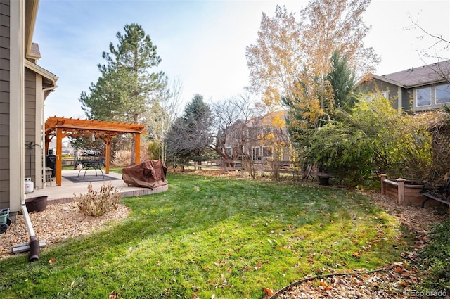 view of yard with a pergola and a patio