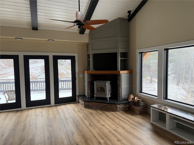 396 Mohawk Hts, Florissant, CO 80816 - unfurnished living room featuring wood ceiling, a ceiling fan, a healthy amount of sunlight, and vaulted ceiling with beams