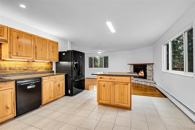 26752 Vosler St, Conifer, CO 80433 - kitchen with black appliances, baseboard heating, dark countertops, and recessed lighting