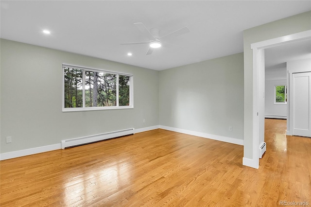 26752 Vosler St, Conifer, CO 80433 - unfurnished room with a baseboard heating unit, a ceiling fan, light wood-style flooring, and recessed lighting