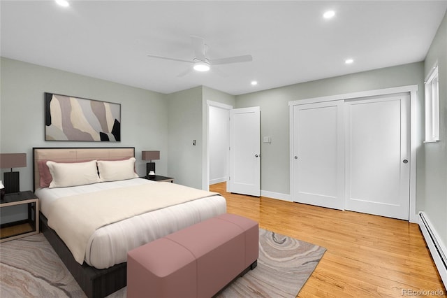 26752 Vosler St, Conifer, CO 80433 - bedroom featuring a baseboard heating unit, light wood-style flooring, recessed lighting, a ceiling fan, and baseboards