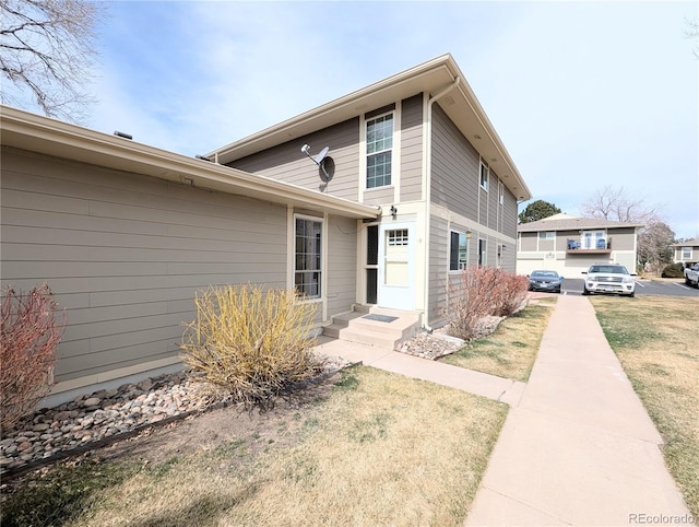 exterior space featuring a lawn