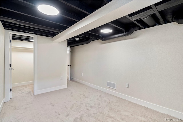 basement with carpet floors