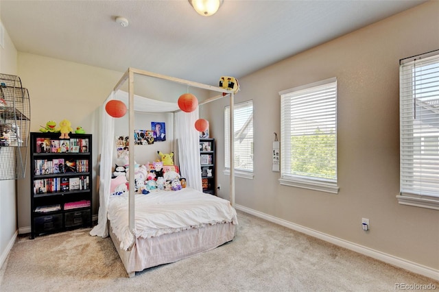 1362 Golden Eagle Way, Louisville, CO 80027 - carpeted bedroom featuring multiple windows