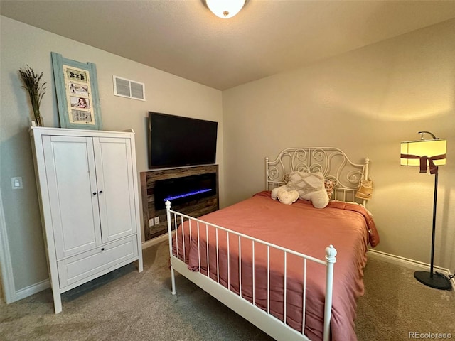 1362 Golden Eagle Way, Louisville, CO 80027 - carpeted bedroom with baseboards and a fireplace