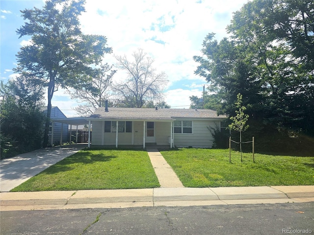 7331 Clay St, Westminster, CO 80030 - single story home with concrete driveway, a front yard, and an attached carport