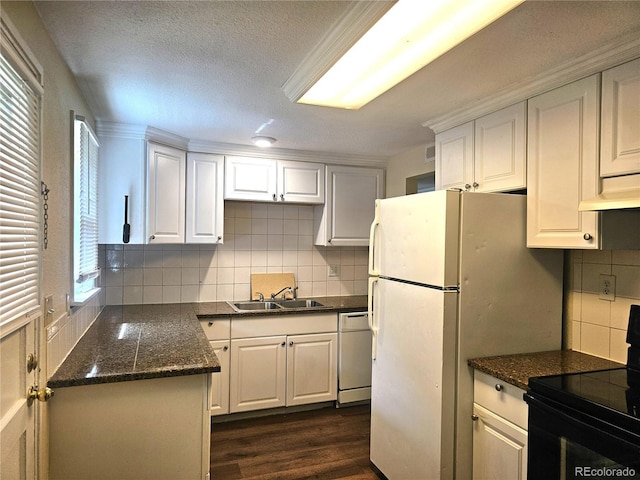 7331 Clay St, Westminster, CO 80030 - kitchen with black electric range, tasteful backsplash, dishwashing machine, white cabinets, and a textured ceiling