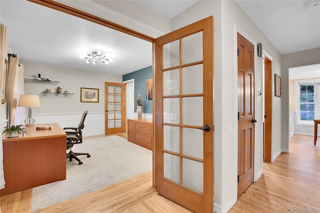 7030 S Fillmore Ct, Centennial, CO 80122 - home office featuring french doors, light wood-style flooring, and baseboards