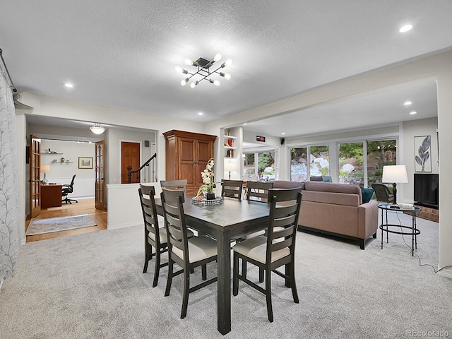 7030 S Fillmore Ct, Centennial, CO 80122 - dining area featuring light carpet, stairway, a textured ceiling, recessed lighting, and a chandelier