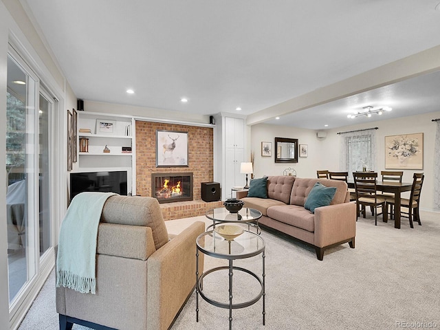 7030 S Fillmore Ct, Centennial, CO 80122 - living area featuring light colored carpet, a brick fireplace, and recessed lighting