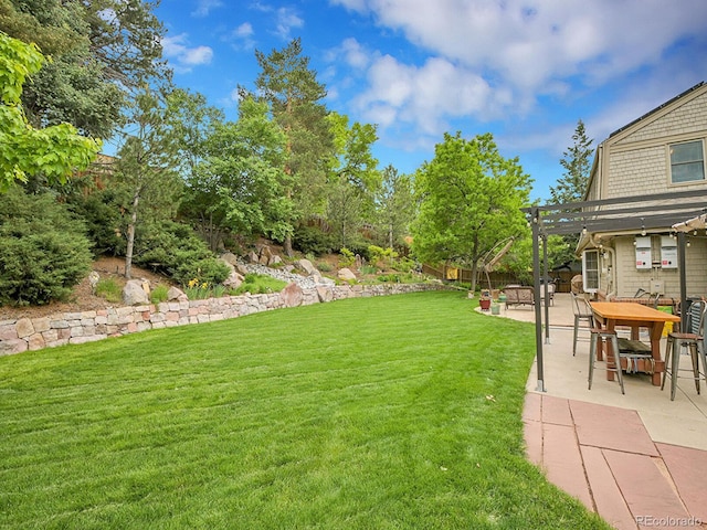 7030 S Fillmore Ct, Centennial, CO 80122 - view of green lawn with a pergola and a patio area