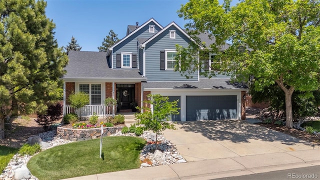 1113 Southbury Pl, Highlands Ranch, CO 80129 - traditional-style home with brick siding, covered porch, concrete driveway, an attached garage, and a chimney