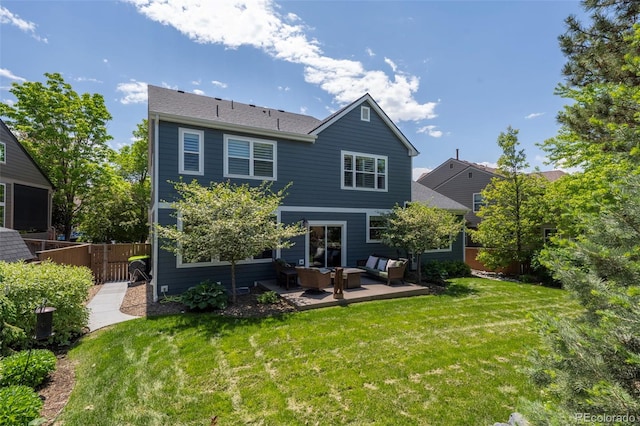 1113 Southbury Pl, Highlands Ranch, CO 80129 - rear view of property with an outdoor living space and a patio