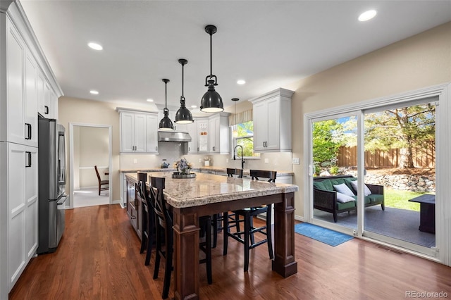 1113 Southbury Pl, Highlands Ranch, CO 80129 - dining room featuring dark wood finished floors and recessed lighting