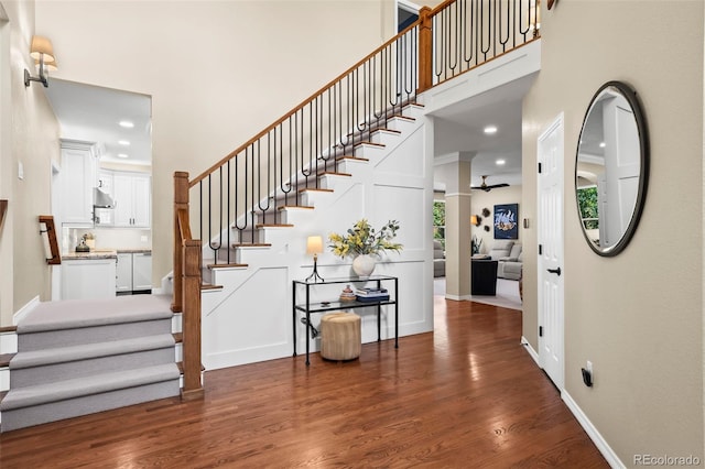 1113 Southbury Pl, Highlands Ranch, CO 80129 - entryway featuring a towering ceiling, stairs, wood finished floors, recessed lighting, and a ceiling fan