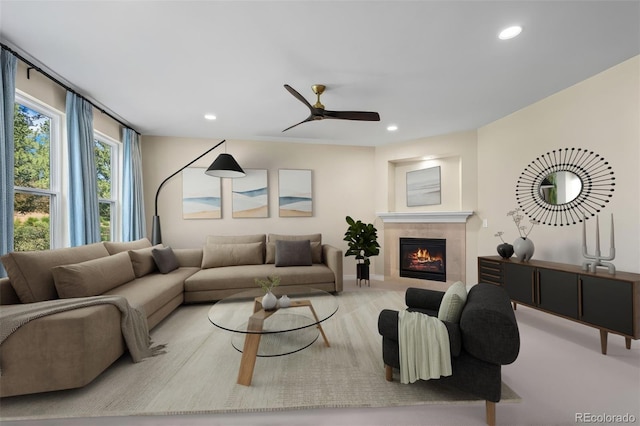 1113 Southbury Pl, Highlands Ranch, CO 80129 - living room with ceiling fan, recessed lighting, a tiled fireplace, and baseboards