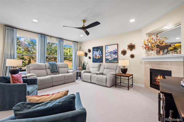 1113 Southbury Pl, Highlands Ranch, CO 80129 - living area with ceiling fan, a fireplace, carpet flooring, recessed lighting, and baseboards