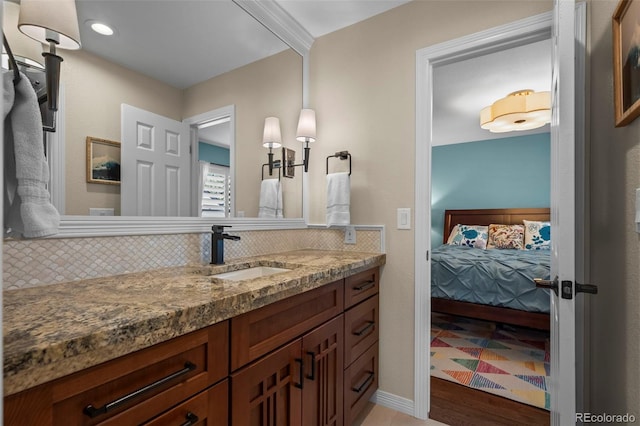 1113 Southbury Pl, Highlands Ranch, CO 80129 - bathroom with vanity and decorative backsplash