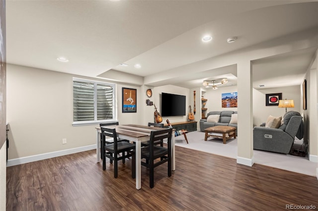 1113 Southbury Pl, Highlands Ranch, CO 80129 - dining space with dark wood-style floors, baseboards, a chandelier, and recessed lighting