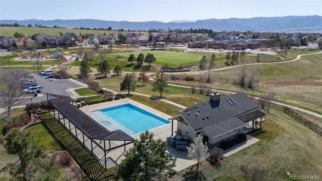 1113 Southbury Pl, Highlands Ranch, CO 80129 - drone / aerial view of a pool and mountains