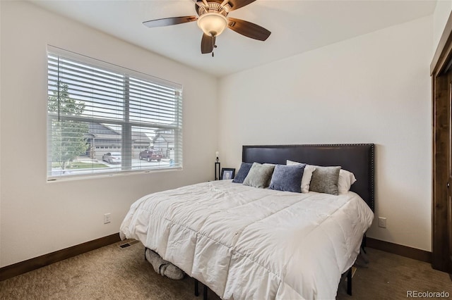 bedroom featuring carpet floors, visible vents, ceiling fan, and baseboards