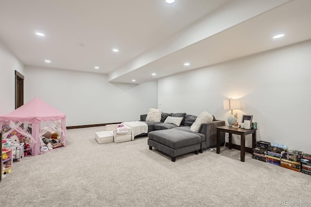 living room with baseboards, carpet flooring, and recessed lighting