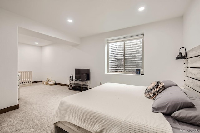 bedroom with carpet floors, recessed lighting, and baseboards