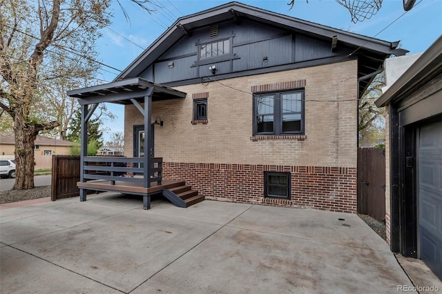 1399 Newton St, Denver, CO 80204 - back of property with brick siding and a patio area