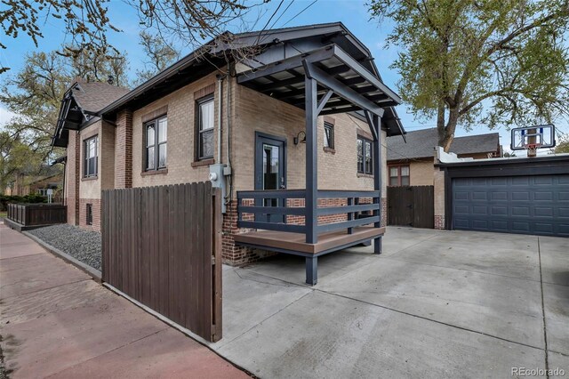 1399 Newton St, Denver, CO 80204 - view of front of house featuring brick siding