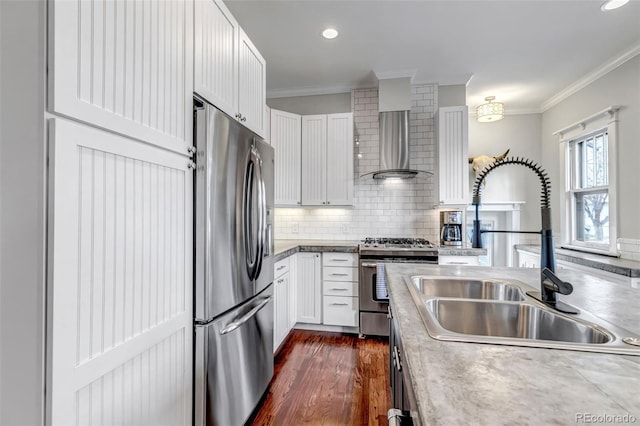 1399 Newton St, Denver, CO 80204 - kitchen with appliances with stainless steel finishes, a sink, crown molding, dark wood-style flooring, and backsplash